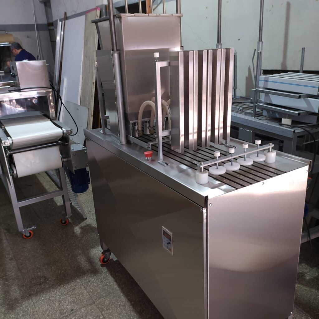dosificadora Máquina dosificadora y armadora de alfajores de 4 picos
